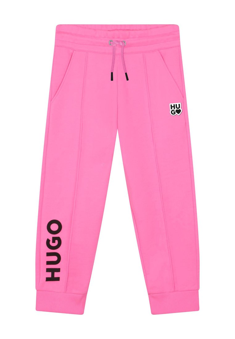 Rosa Jogginghose aus einem weichen Stoff, mit seitlichen Taschen, einem Kordelzugbund und schwarzem "HUGO"-Branding an der Seite.