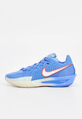 Blauer Nike Athletikschuh mit strukturiertem Obermaterial, Belüftungsperforationen, weißem Swoosh und einer kontrastierenden blauen Sohle mit "zoomx"-Detail.