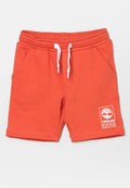Orangene Baumwollshorts mit elastischem Bund und weißem Kordelzug. Verfügt über zwei Seitentaschen und ein Timberland-Logo-Patch auf der Vorderseite.