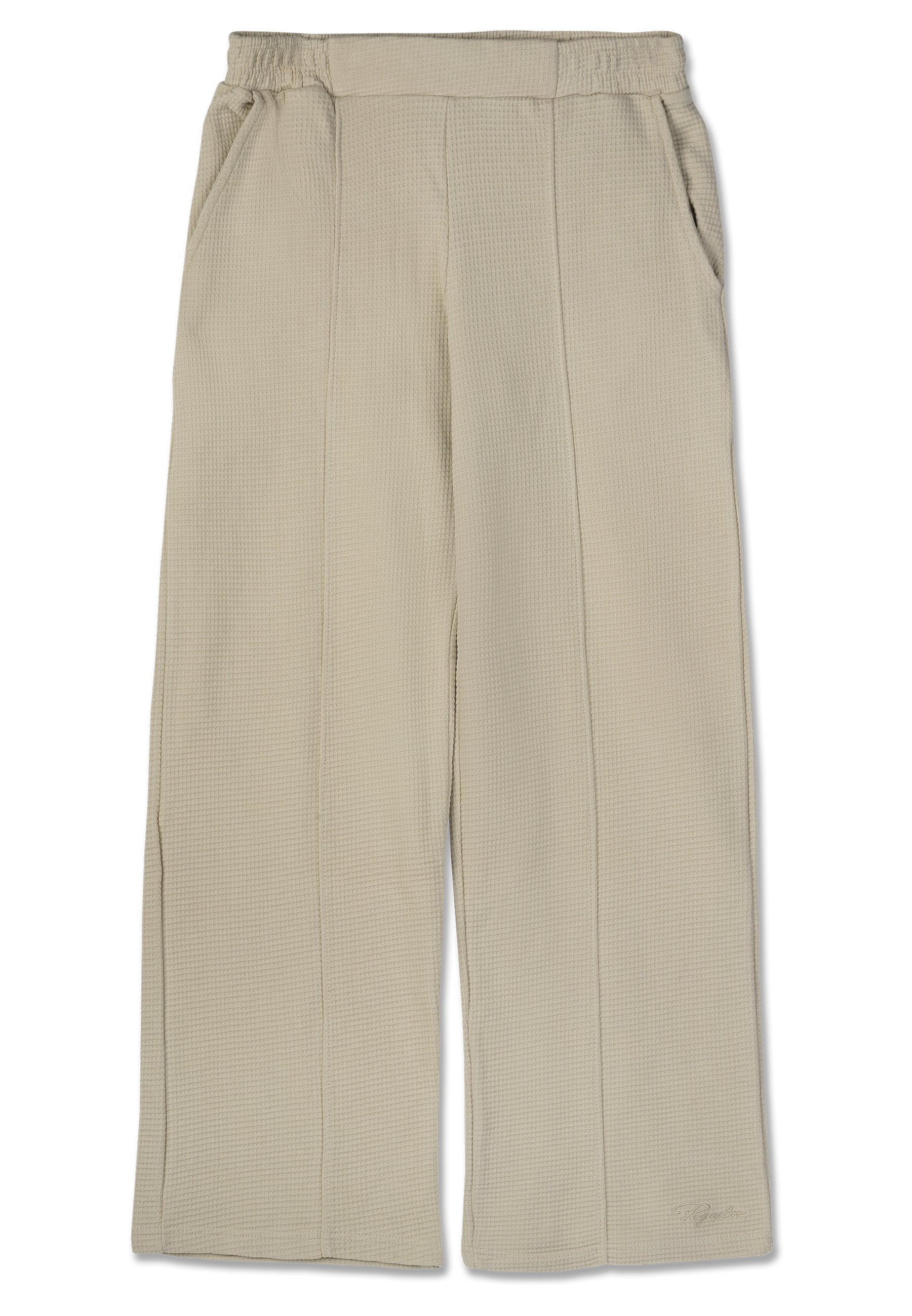Beige weite Hose mit elastischem Bund, strukturiertem Stoff, zwei seitlichen Taschen und gesteppten Details an der Vorderseite.