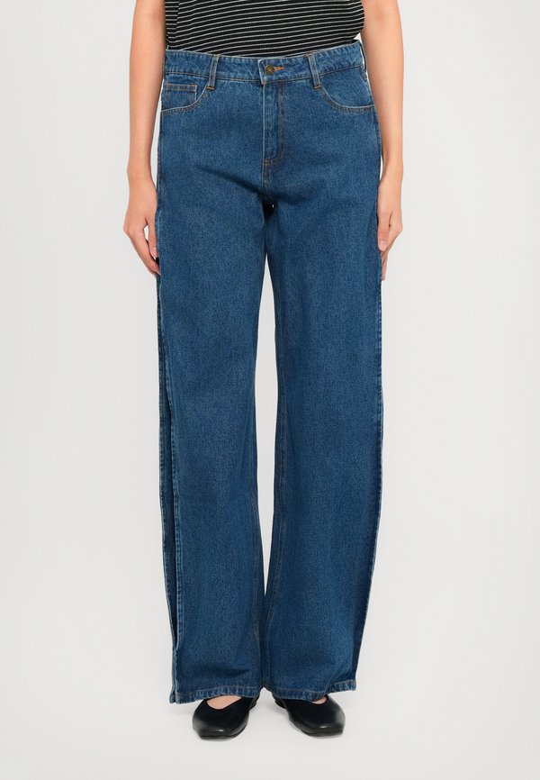 DESIGNERS REMIX MILES BARRELL JEANS