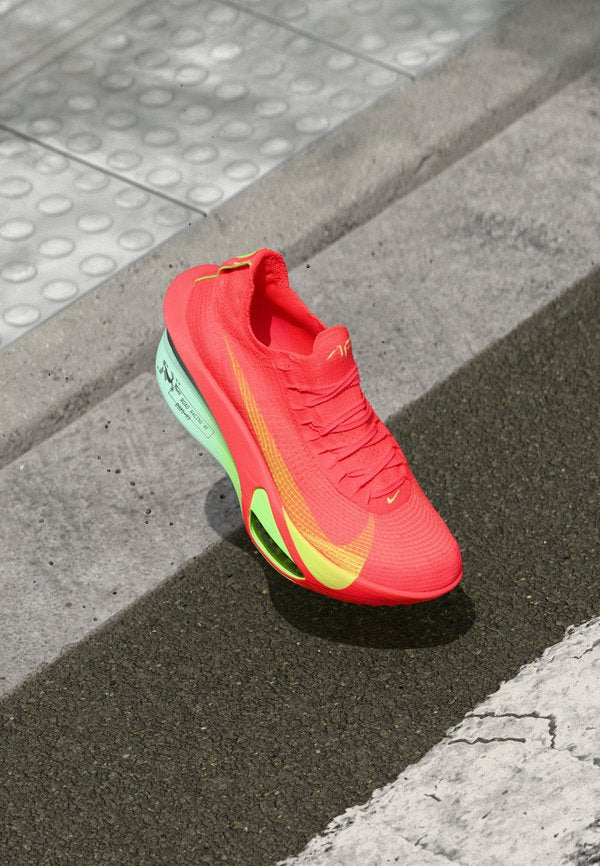 Nike Performance ALPHAFLY 3 - Road running shoes - bright crimson/lime blast/mint foam/cave purple
