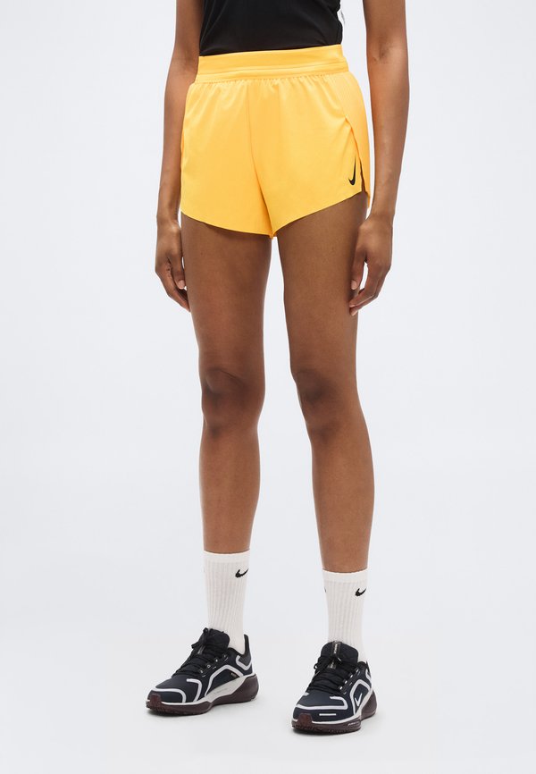 Nike Performance W NK ARSWFT DFADV MR 3IN SHORT - Sports shorts - laser orange/black/white