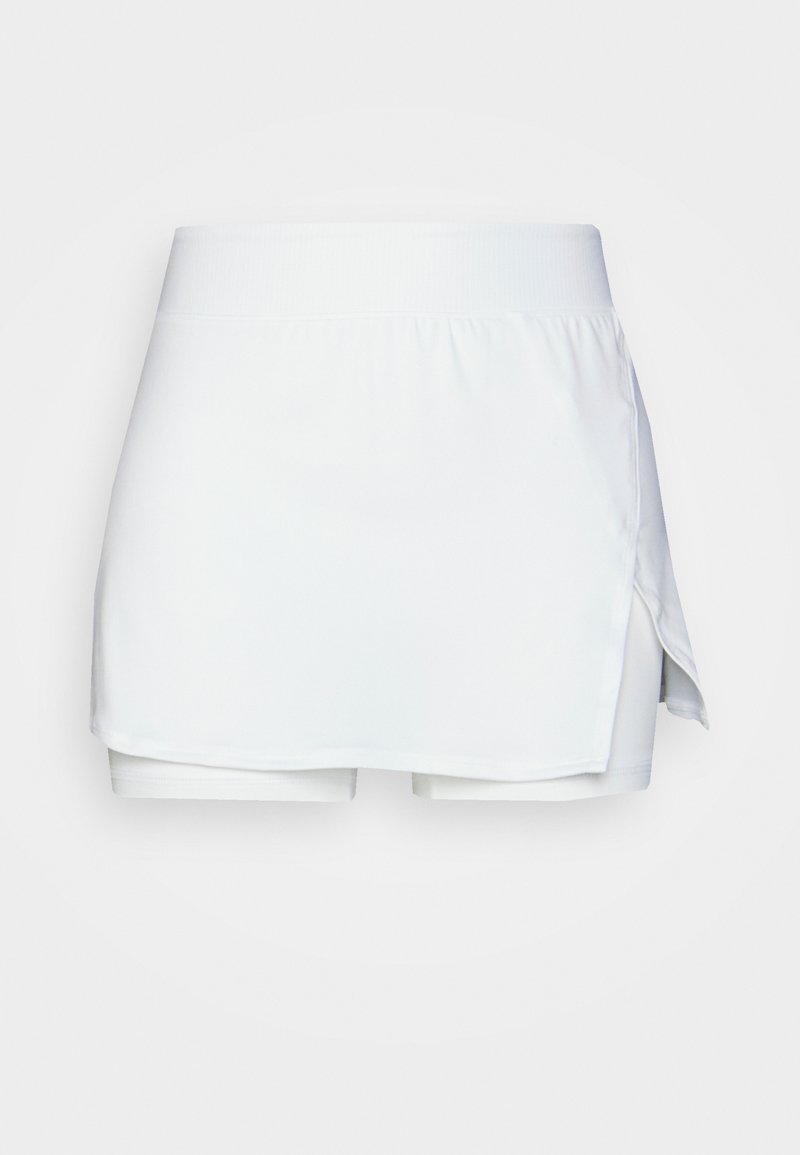 Weiße Skort aus weichem, dehnbarem Material. Verfügt über einen hohen Bund und einen seitlichen Schlitz. Eingebaute Shorts sorgen für Deckung und Komfort.
