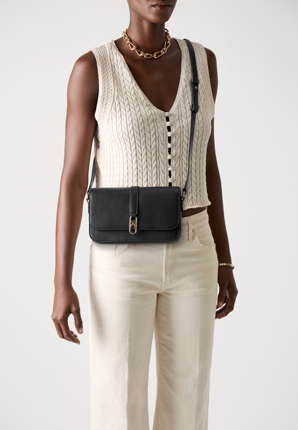 Tommy Hilfiger TH LIBRE FLAP CROSSOVER - Cross body bag - black
