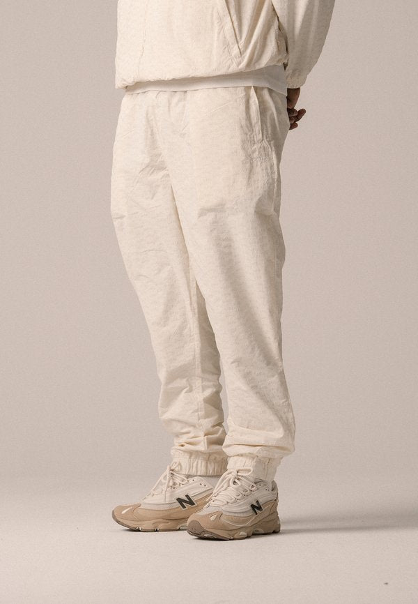 BLKVIS ALLOVER TRACK PANTS UNISEX