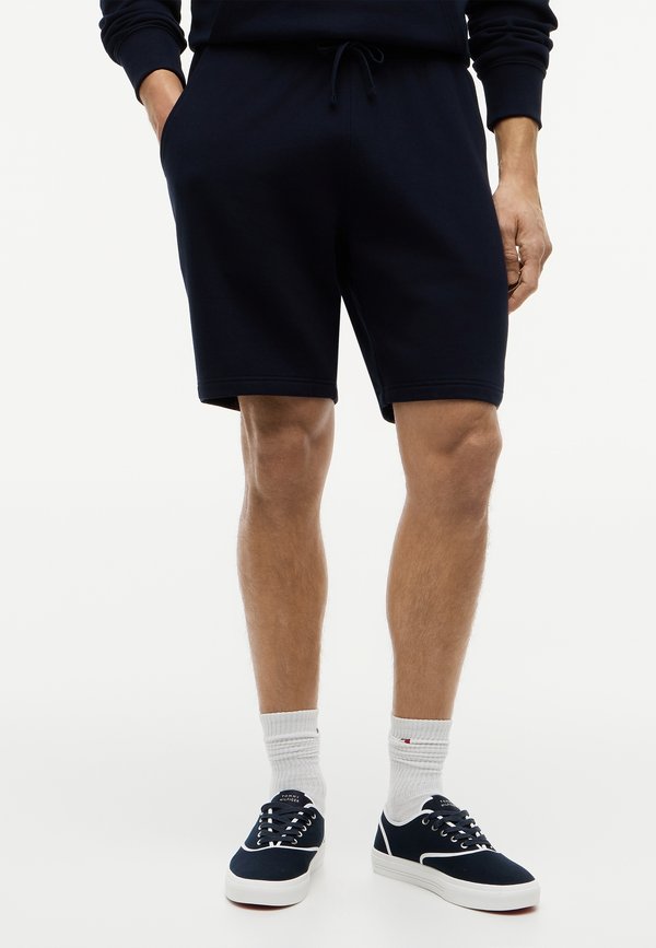 Tommy Hilfiger ESSENTIAL - Tracksuit bottoms - desert sky