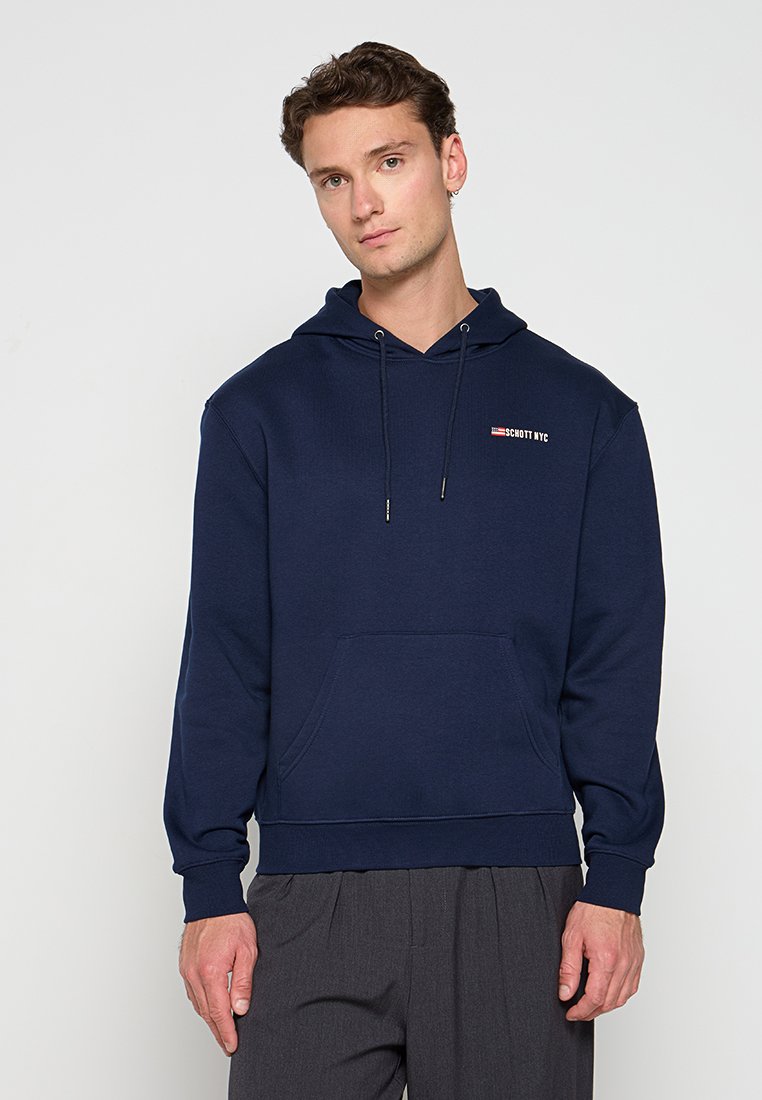 Marineblaue Hoodie aus Baumwolle, mit einer Fronttasche und verstellbaren Kordeln. Enthält ein kleines Logo auf der Brust.
