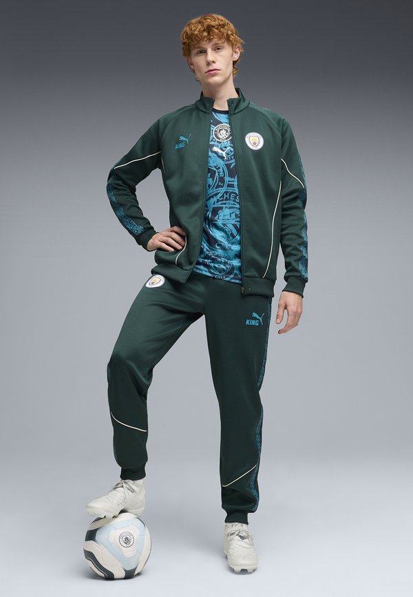 Puma MANCHESTER CITY FC KING ANTHEM PANT - Club wear - green terrain-tropical blue