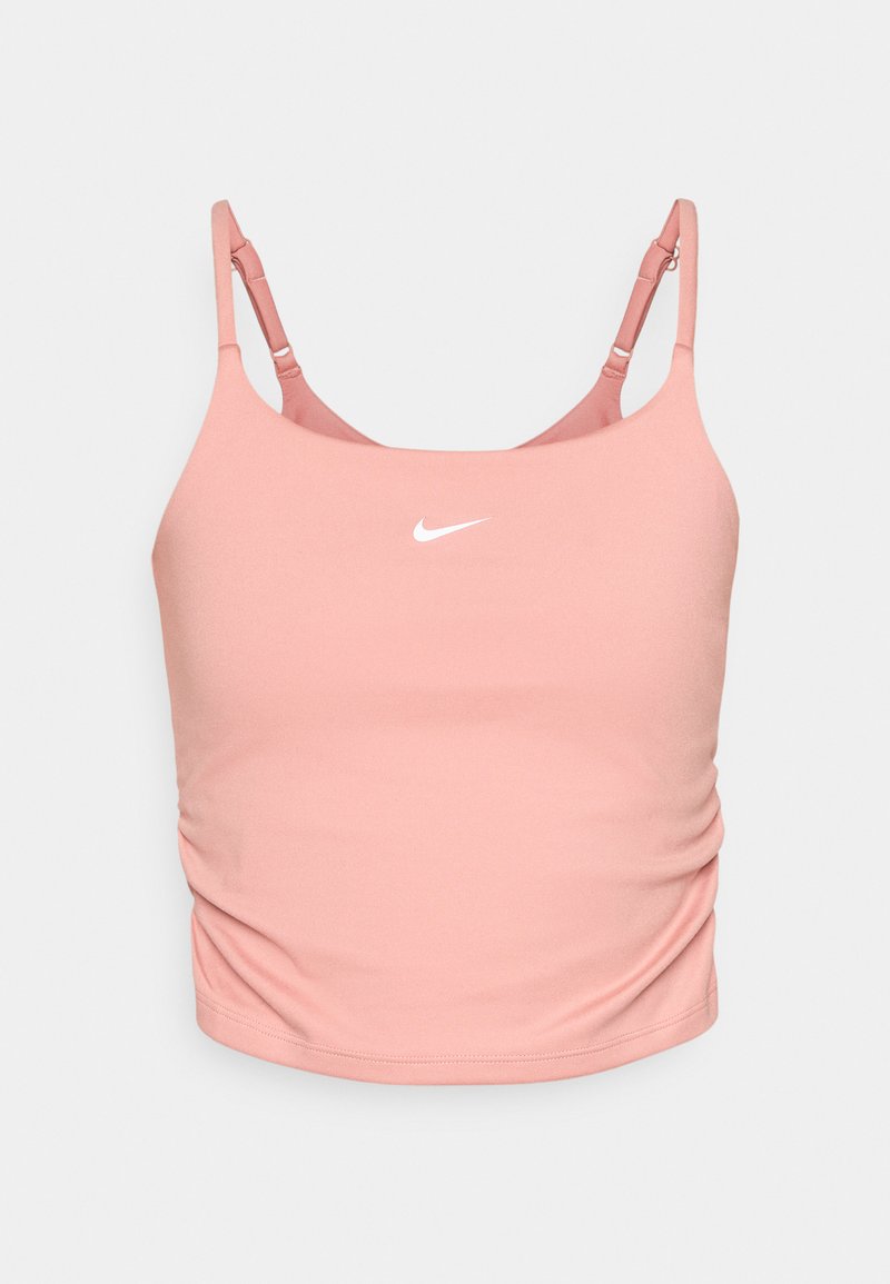 Rosa Sport-BH aus weichem Stoff, mit schmalen verstellbaren Trägern und einem weißen Nike-Logo auf der Vorderseite. Leichte Raffung an den Seiten.