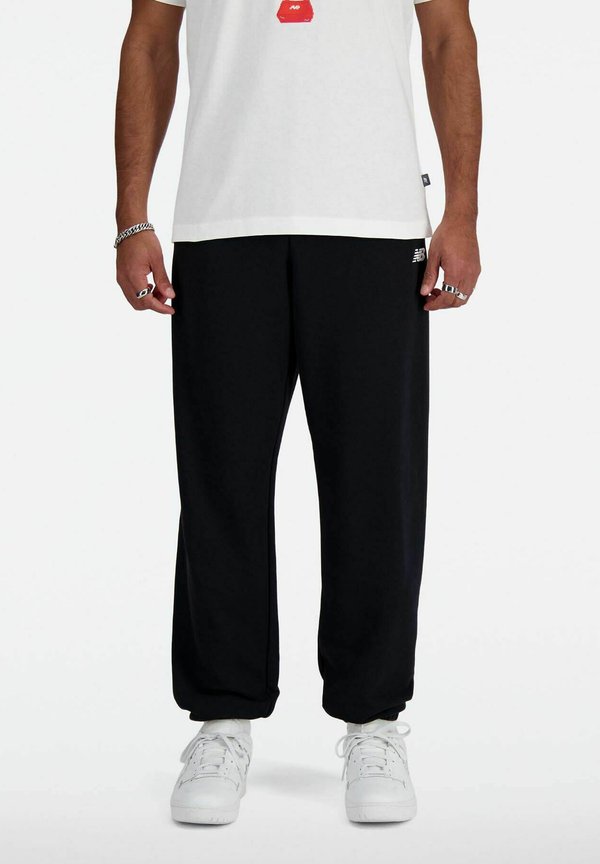 New Balance JOGGING - Tracksuit bottoms - schwarz
