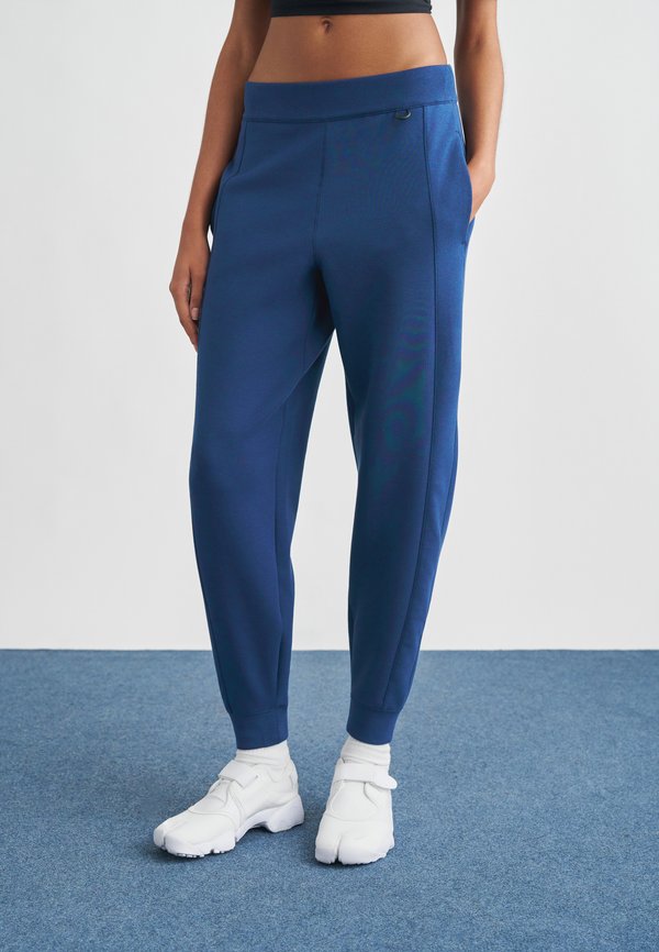 Nike Sportswear SOFT - Tracksuit bottoms - midnight navy/dark obsidian