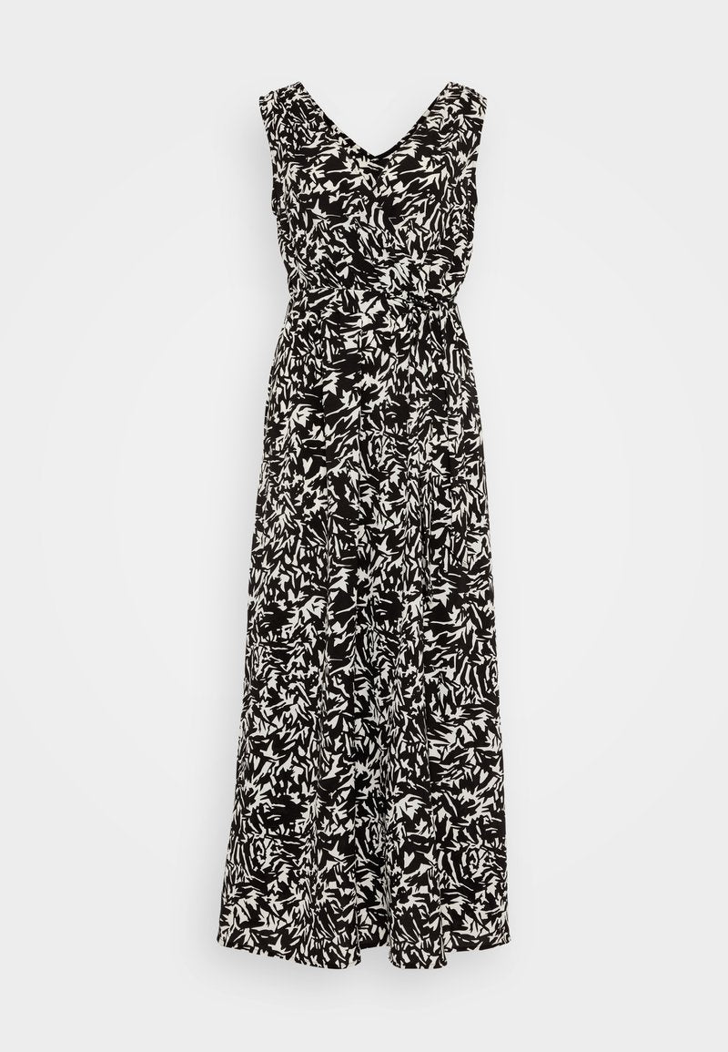 Schwarz-weißer ärmelloser Maxikleid mit V-Ausschnitt, gedrehtem Taillen-Detail und einem abstrakten Blättermuster. Glatte Stofftextur.