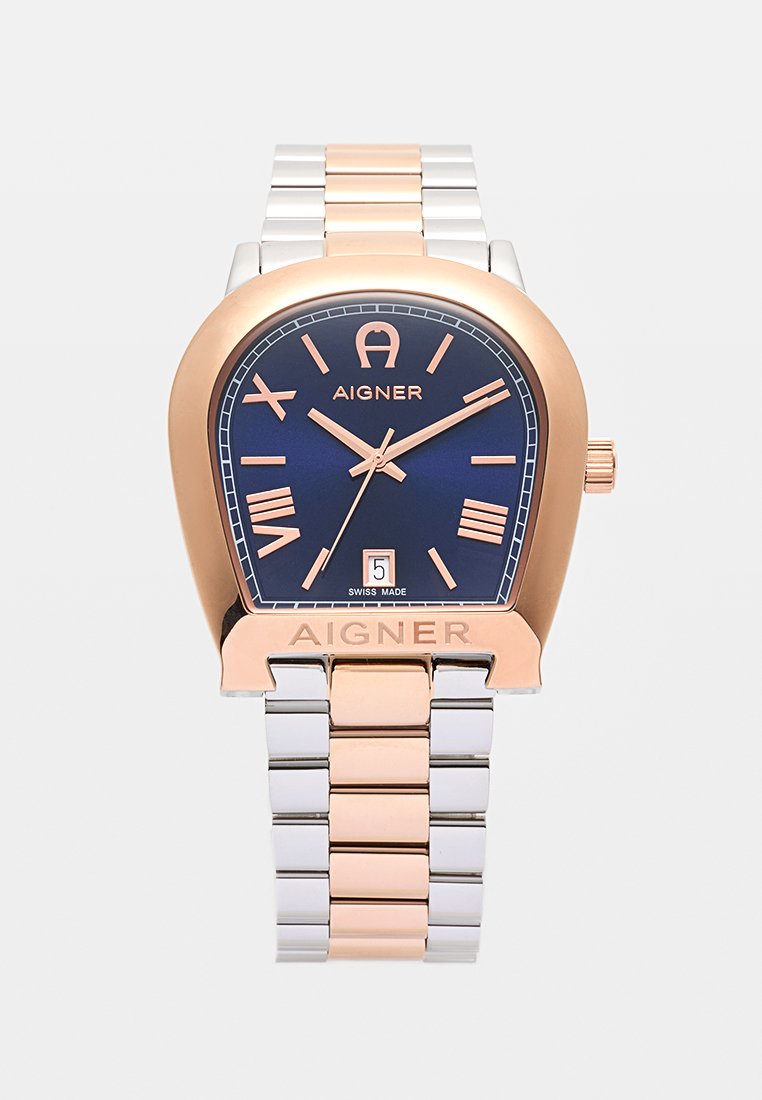 Uhren aus roségold und Silber mit einem abgerundet rechteckigen Gehäuse, blauem Zifferblatt, römischen Ziffern und einem Datumsdisplay. Schweizer Herstellung.