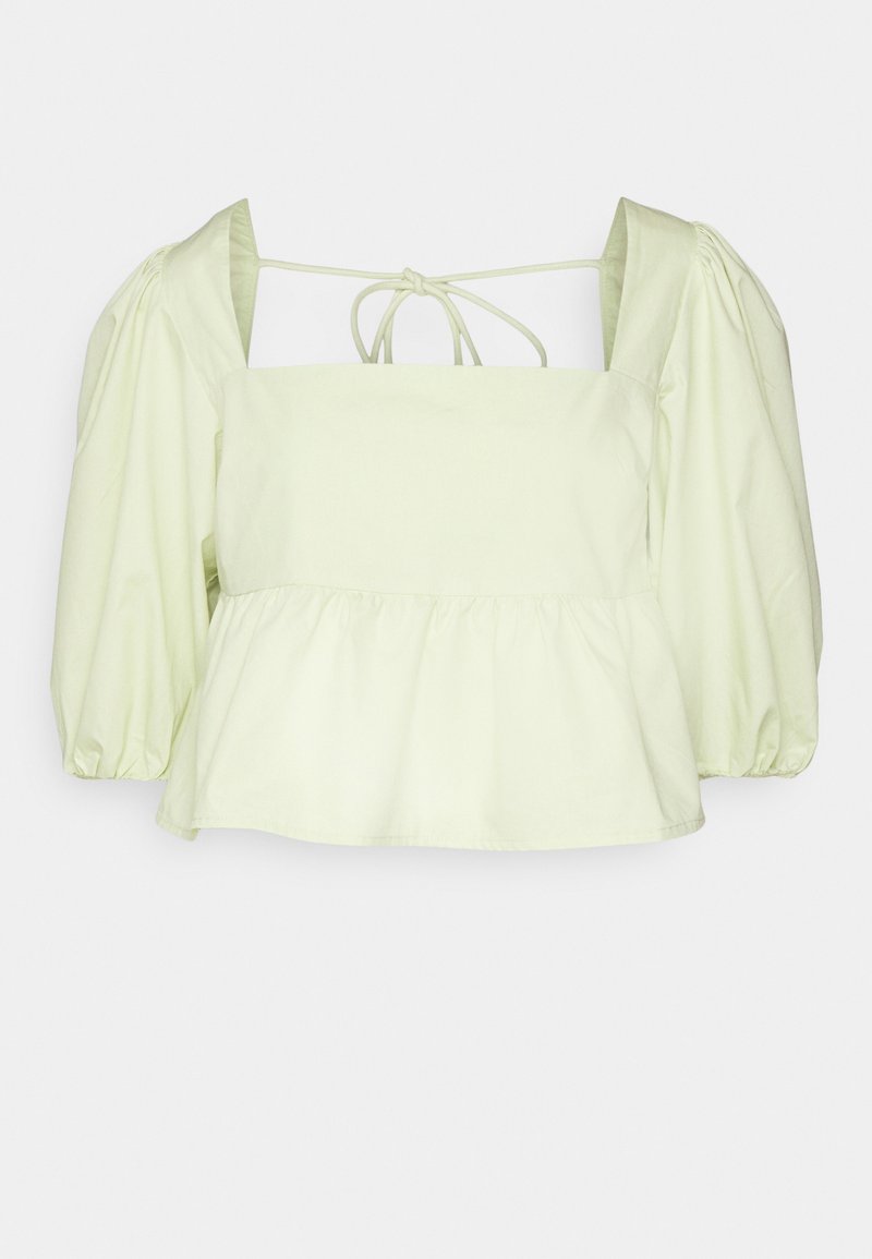 Hellgrüne Bluse mit Puffärmeln, quadratischem Ausschnitt, Peplum-Saum und Bindeband am Rücken. Hergestellt aus einem glatten Stoff mit subtiler Schimmer.
