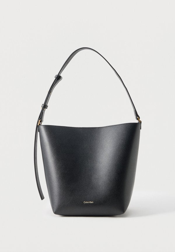 Calvin Klein FOIL LOGO MEDIUM BUCKET - Handbag - black/toasted coconut