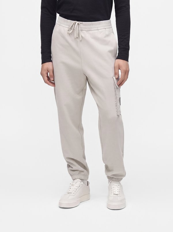 Calvin Klein Jeans BADGE JOGGER - Tracksuit bottoms - moonstruck