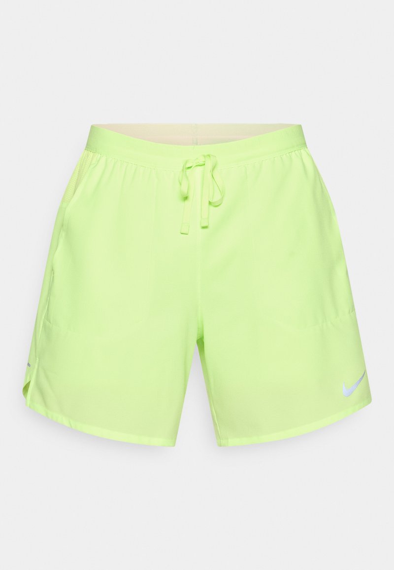 Neongrüne Sportshorts mit elastischem Bund, verstellbarem Kordelzug, Seitentaschen und einem kleinen reflektierenden Nike-Logo unten rechts.