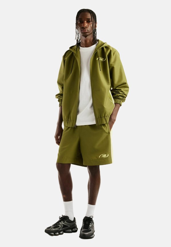 New Balance TRACKSIDE WOVEN JACKET - Outdoor jacket - sport green fennel seed