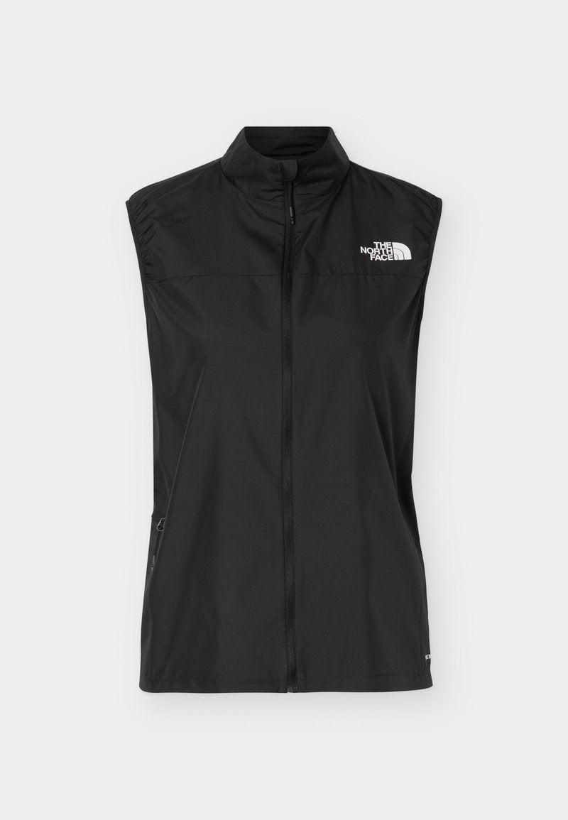 Schwarze ärmellose Weste mit Reißverschluss und Stehkragen, seitlichen Reißverschlusstaschen und weißem The North Face Logo auf der Brust.