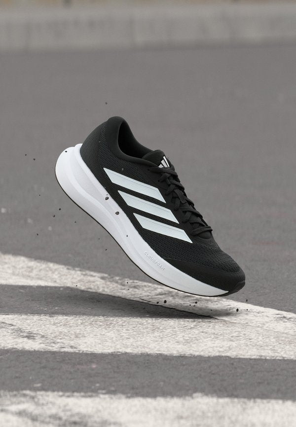 adidas Performance RUNFALCON - Road running shoes - core black/footwear white/carbon