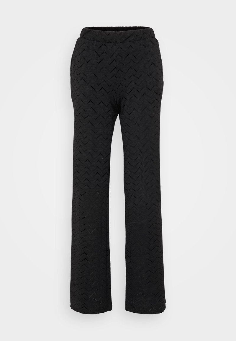 Schwarze weite Hose mit strukturiertem Zickzackmuster, elastischem Bund und leichtem Stoff für hohen Tragekomfort.