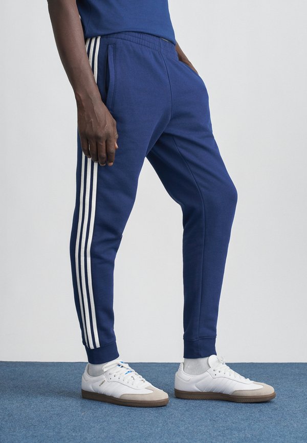 adidas Originals Tracksuit bottoms - night indigo
