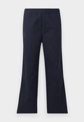 Marineblaue, schmal geschnittene Hose aus glattem Material. Mit einem elastischen Bund und seitlichen Taschen. Klare Linien und minimalistisches Design.