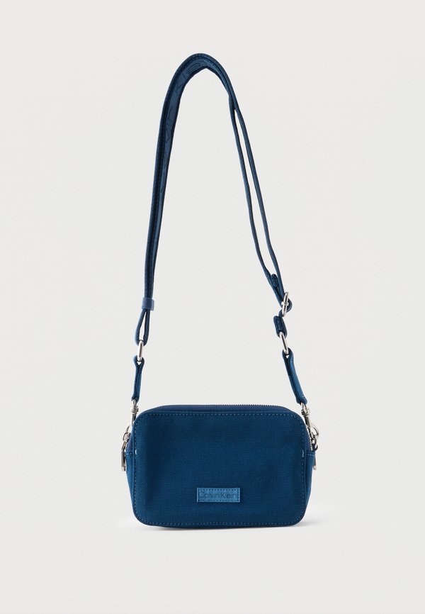 Calvin Klein WEBBING STRAP CAMERA BAG - Camera bag - ensign blue