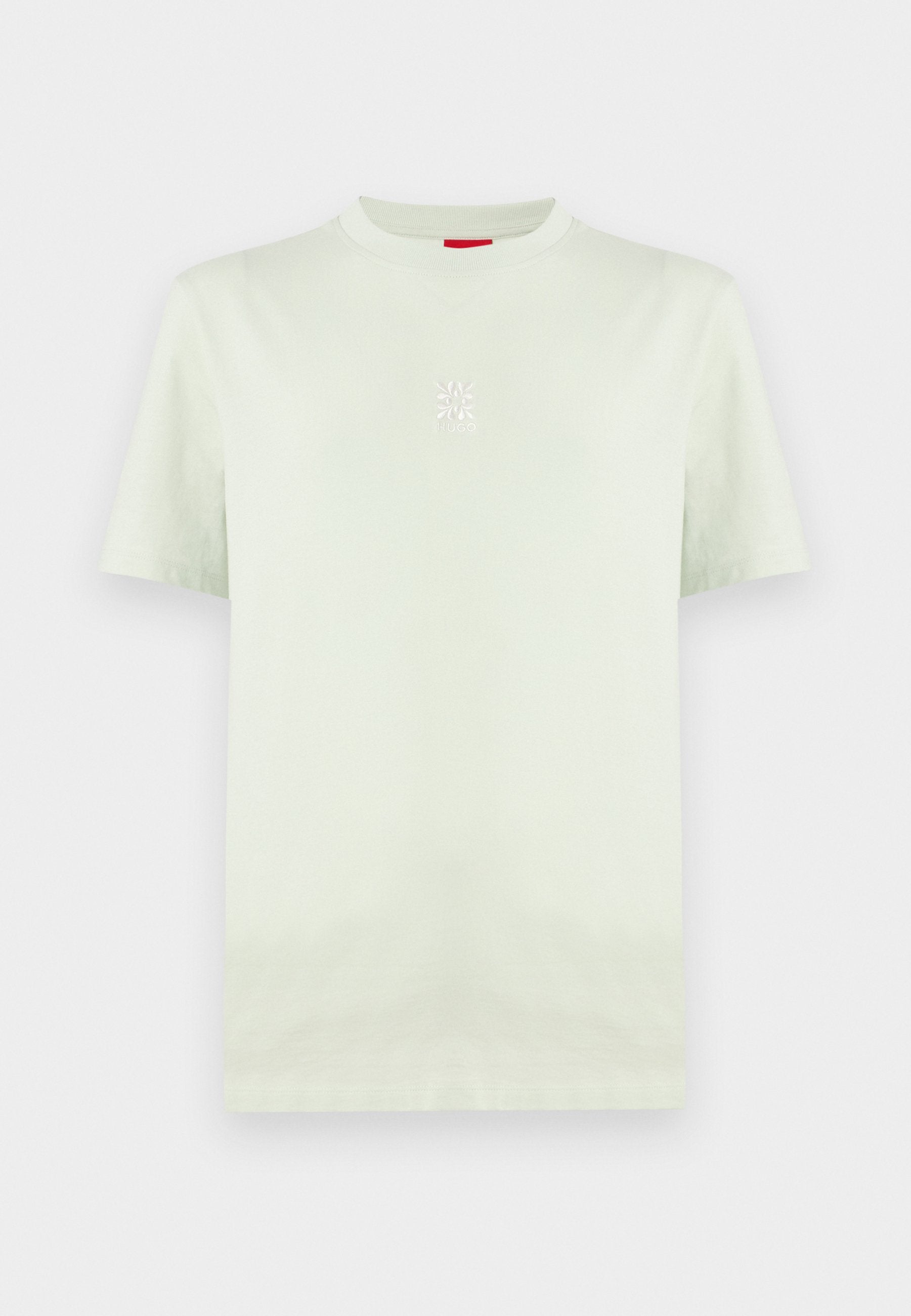 Cremefarbenes T-Shirt mit kurzen Ärmeln und Rundhalsausschnitt mit kleinem weißem Blumenlogo mittig auf der Brust vor schlichtem Hintergrund.