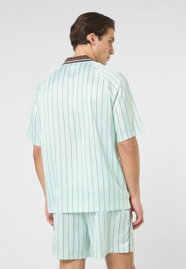 Fila COVERCIANO LOOSE STRIPED