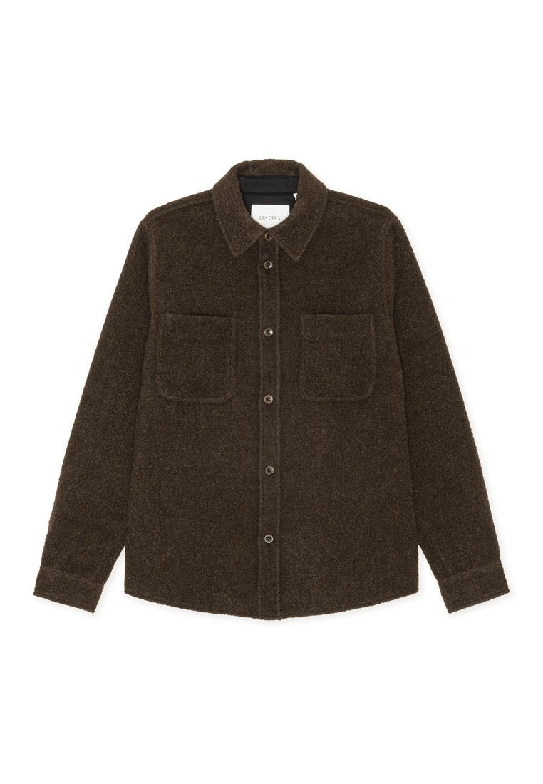 Braune Wollhemdjacke mit Kragen, langen Ärmeln, zwei Fronttaschen und Knopfleiste. Texturiert und mit einer weichen Optik.