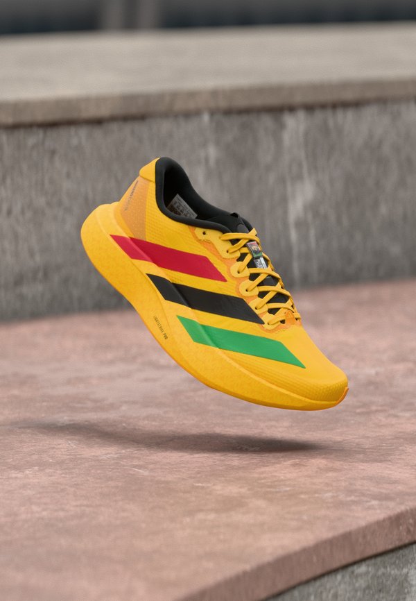 adidas Performance ADIZERO EVO SL - Trainers - bold gold-coloured/vivid green/pure ruby