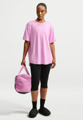 Nike Performance W NK1 DF TIE BACK SS - Sports T-shirt - pink rise/white