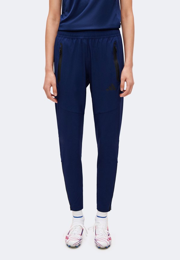adidas Performance TIRO TRAVEL PANTS - Tracksuit bottoms - team navy blue 2/black
