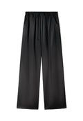 Schwarze, weite Hosen aus glattem Stoff mit einem elastischen Bund und Kordelzug. Enthält seitliche Taschen.