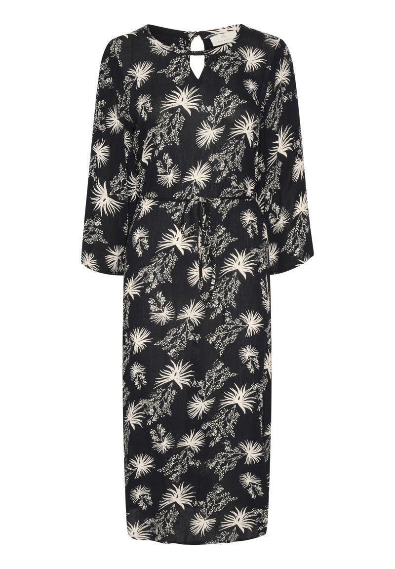 Schwarzes, knielanges Kleid mit einem weißen Blumenmuster. Verfügt über lange Ärmel, einen verstellbaren Taillenzug und ein Schlüssellochdetail im Rücken.