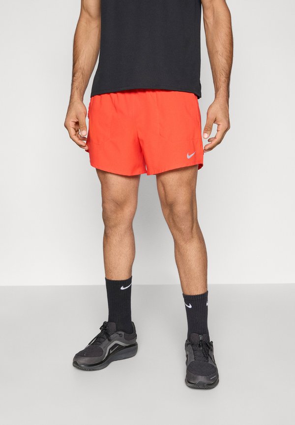 Nike Performance STRIDE SHORT - Sports shorts - light crimson/reflective silver-coloured