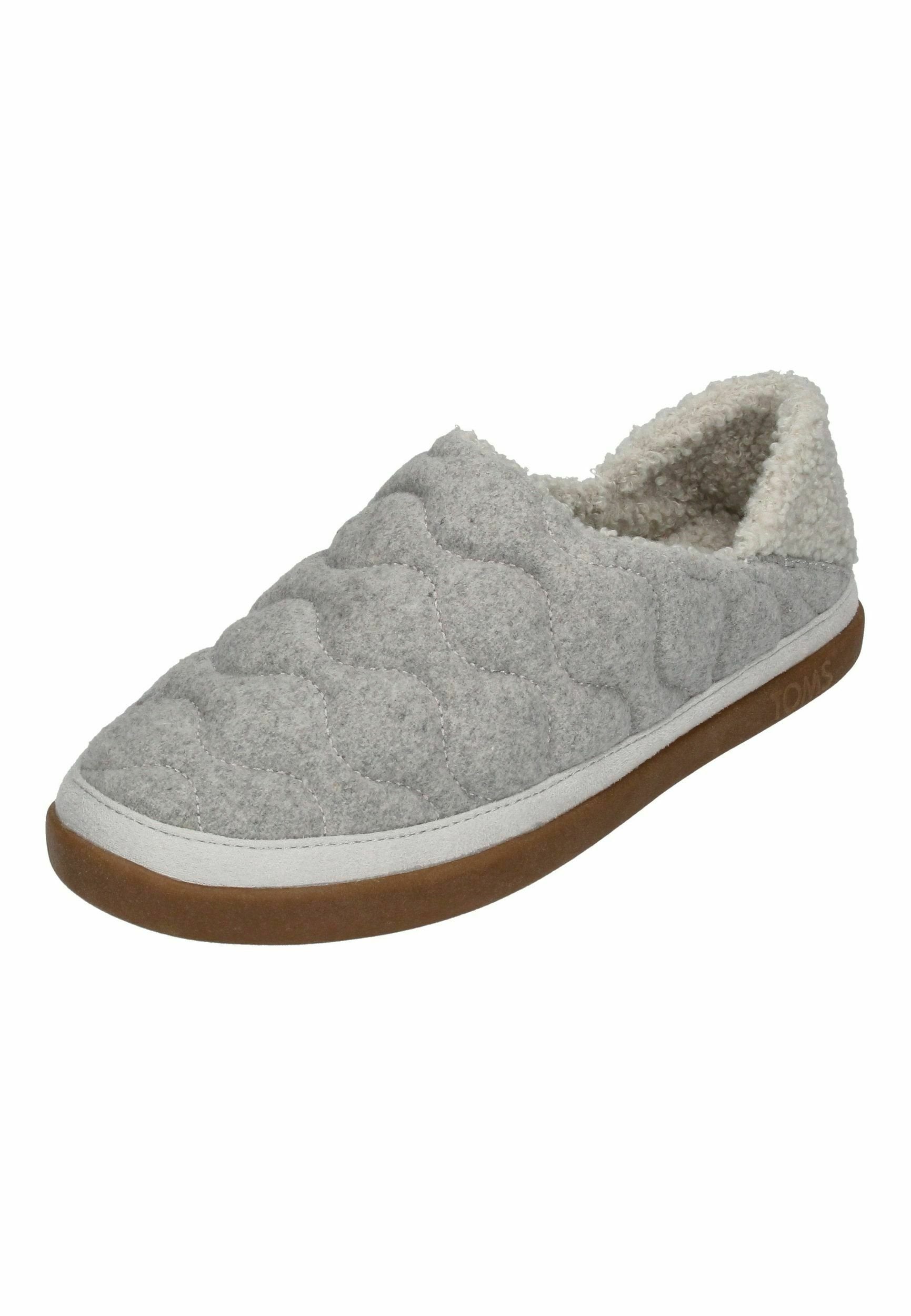 TOMS EZRA