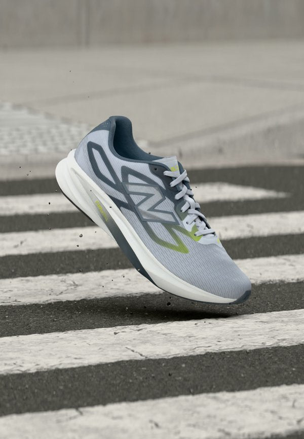 New Balance FUELCELL FLITE - Road running shoes - fresh air/shadow blue/alkaline green
