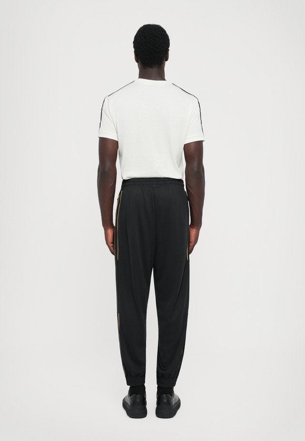 EA7 Emporio Armani TRAIN SOCCER PANTS