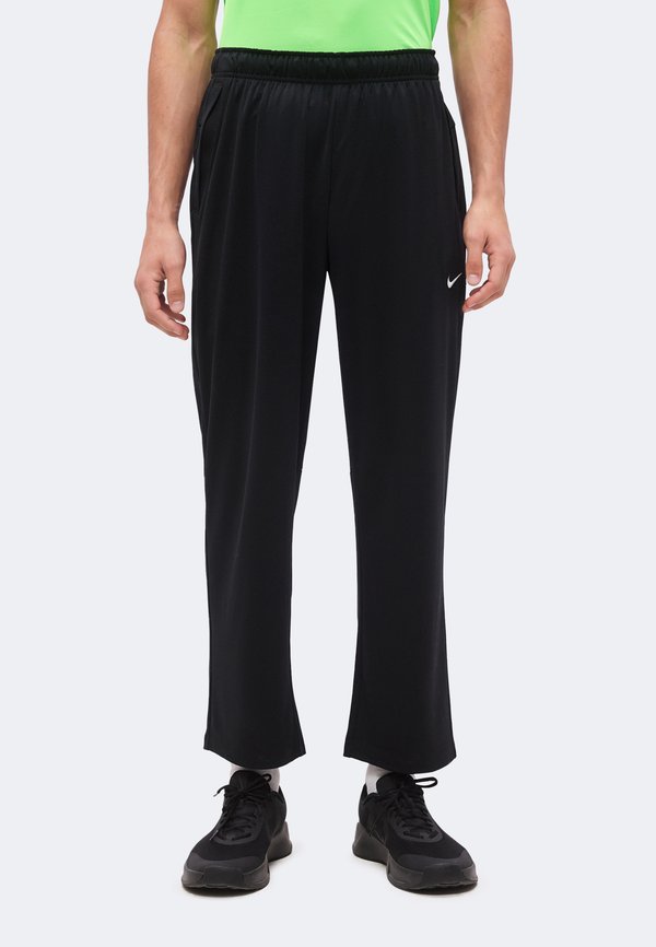 Nike Performance FLEX - Tracksuit bottoms - black/white