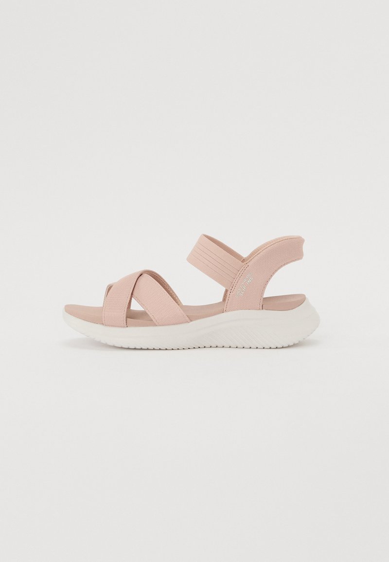 Helle rosa Sandalen mit einem Kreuzriemendesign, elastischen Bändern und einer gepolsterten weißen Sohle. Aus Textilmaterial für Komfort gefertigt.