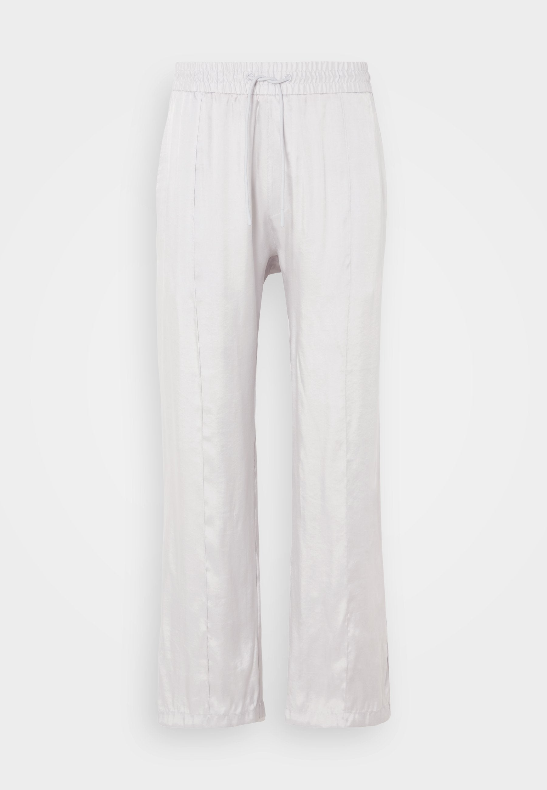 Hellgraue, locker geschnittene Hose aus glattem Stoff mit einem elastischen Bund und Kordelzug. Gerade Beine mit dezenten Falten, ohne sichtbare Muster.