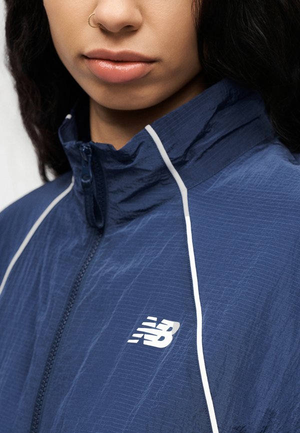 New Balance SPORT LEGACY JACKET