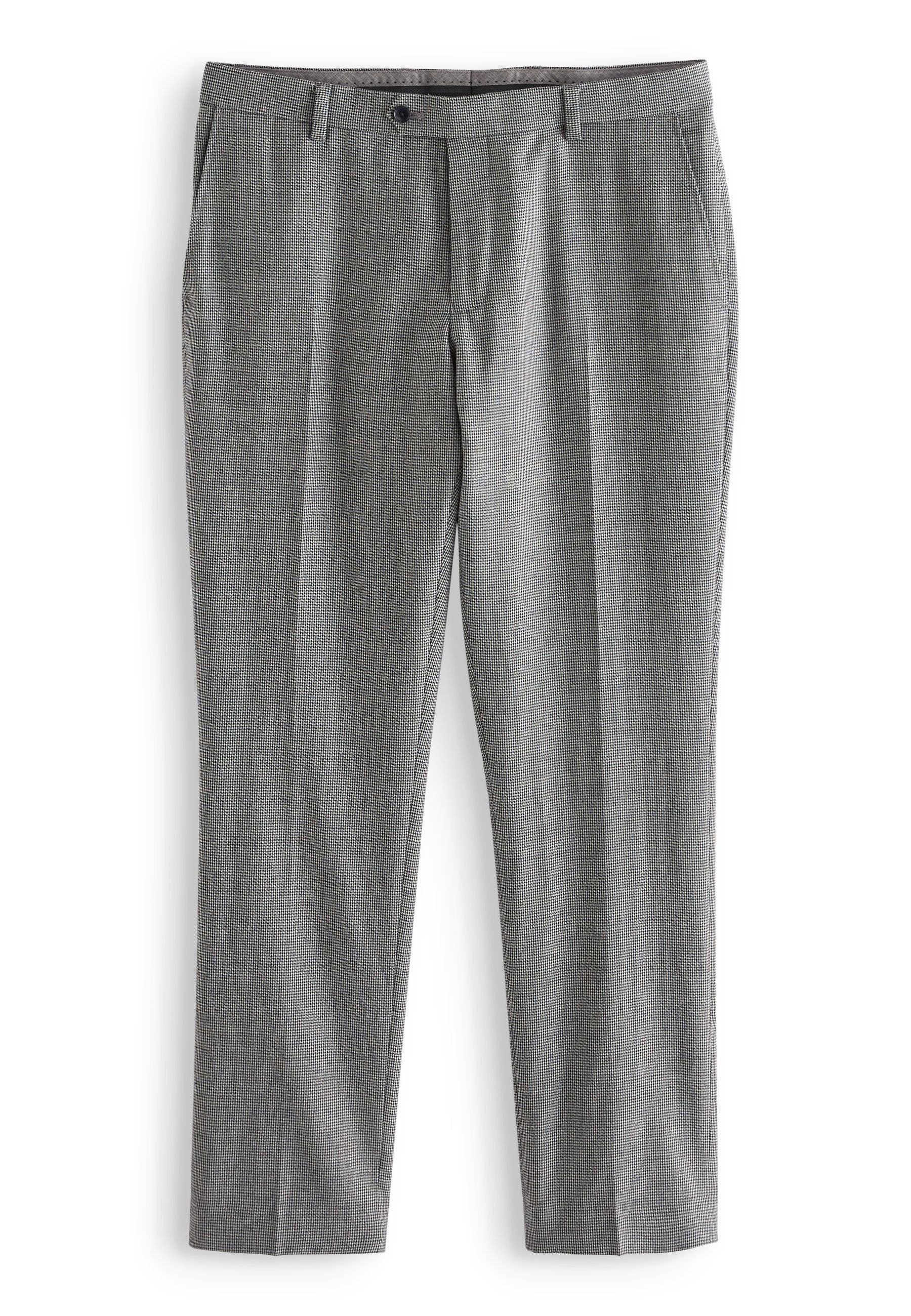 Grau zugeschnittene Hose mit dezentem Karomuster, mit Vorderentaschen, Gürtelschlaufen, Knopfverschluss und schmal geradem Bein.