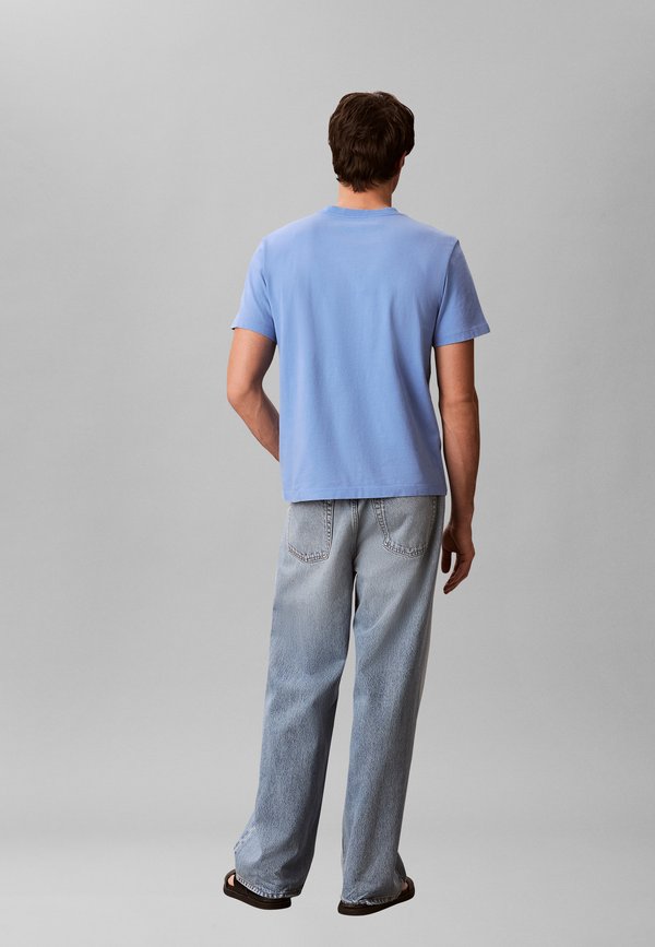 Calvin Klein Jeans SS 20S ACID WASH MONOLOGO GRAPHI - Print T-shirt - marina