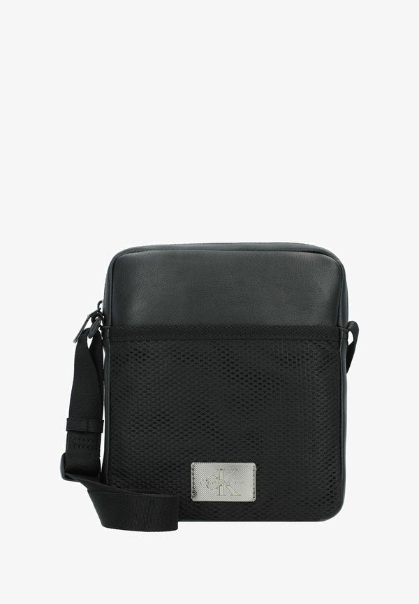 Calvin Klein Jeans TAGGED   - Cross body bag - black