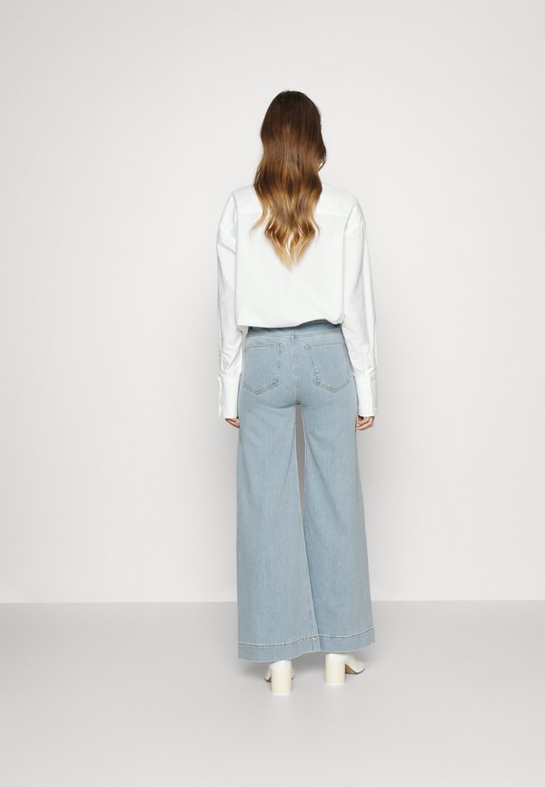 DESIGNERS REMIX WYATT WIDE
