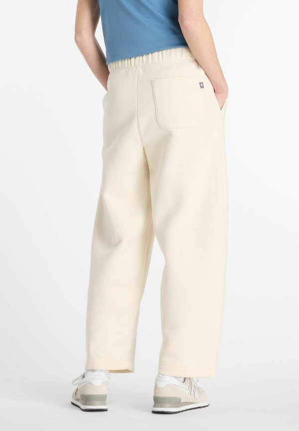 New Balance REIMAGINED  - Tracksuit bottoms - linen